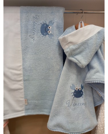 Accappatoio poncho in spugna di cotone e pon pon