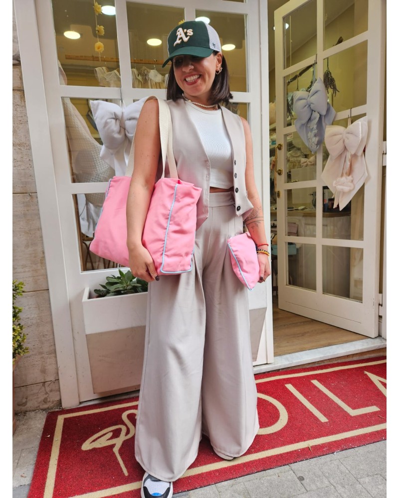 Odette con zip rosa baby profilo turchese