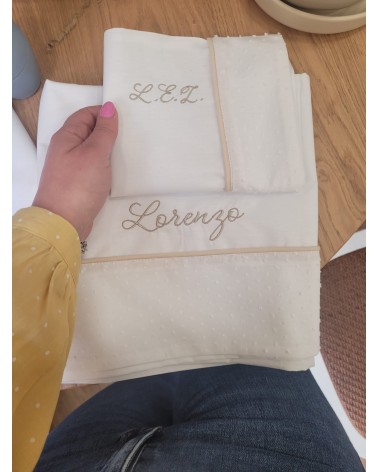 Lenzuolino in cotone con profilo e fascia di plumetis