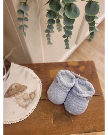 Scarpine neonato in lana con bottoncino al lato